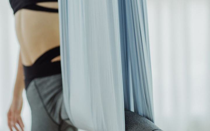 Aerial silk hanging from a carabiner